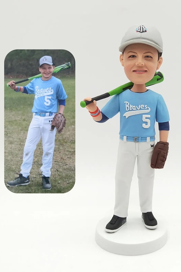 Personalized gifts for kids: A custom bobblehead based on their photo at Dog cake toppers studio