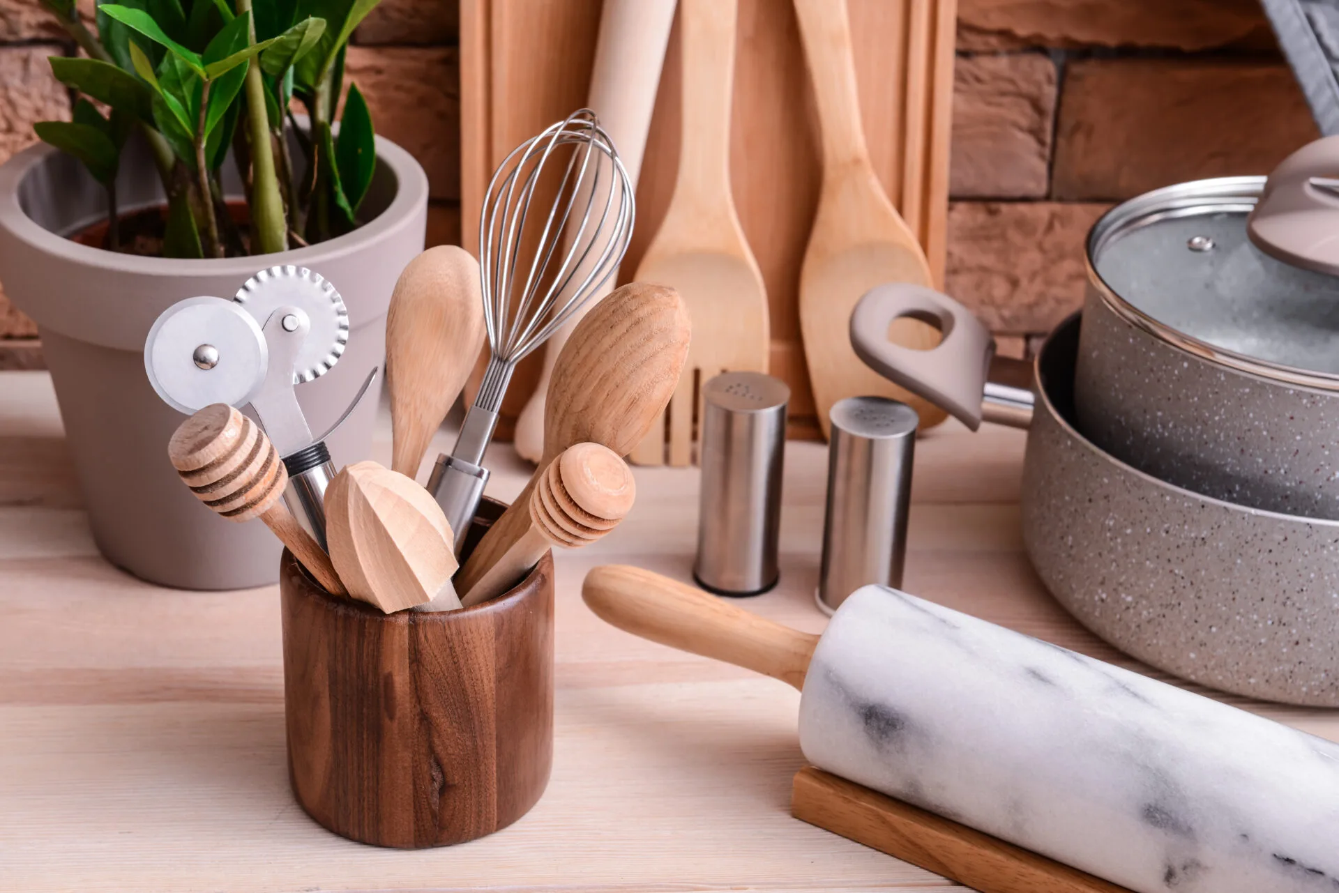 Set of kitchen utensils on table