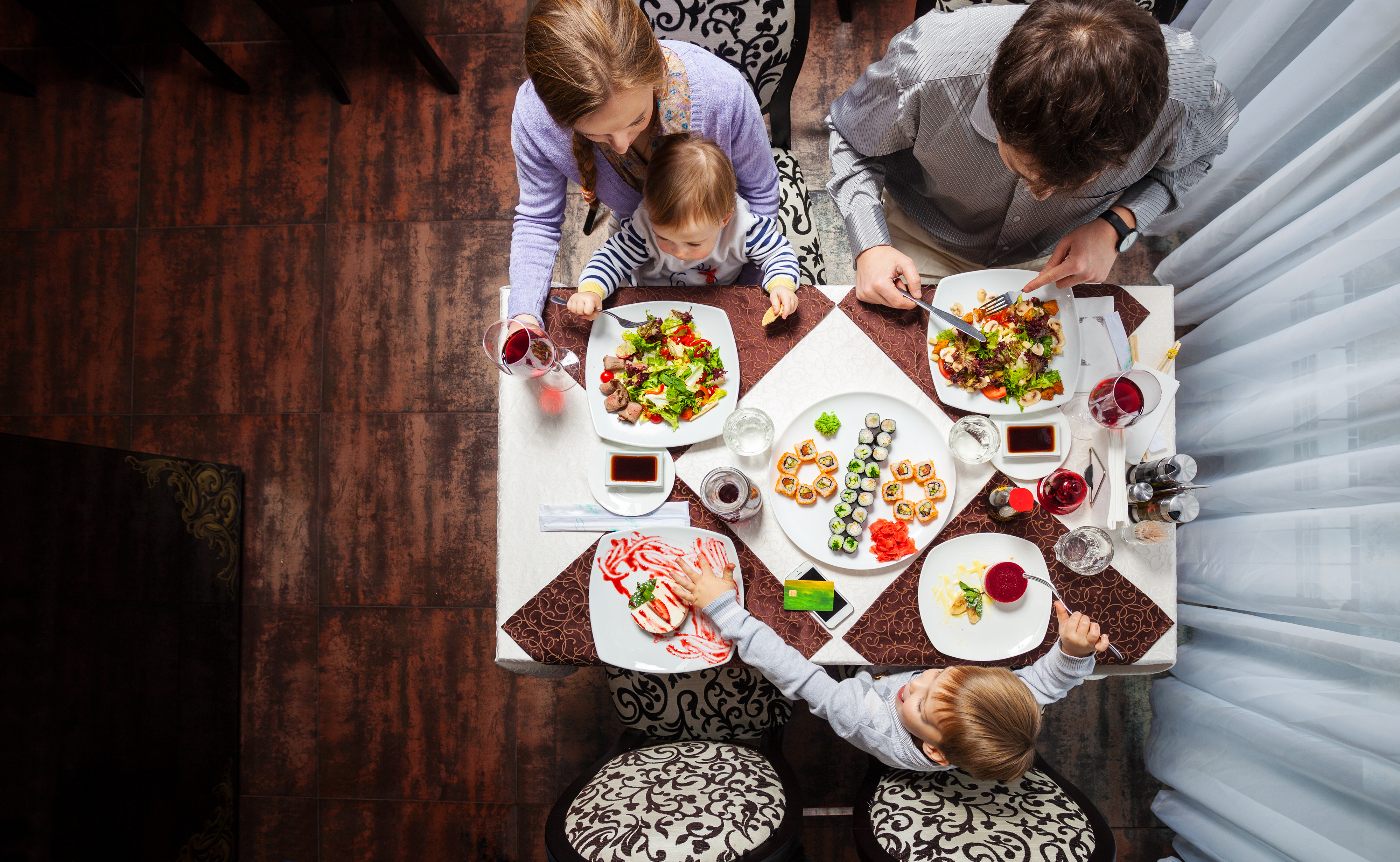 toddler sit still at the table photo