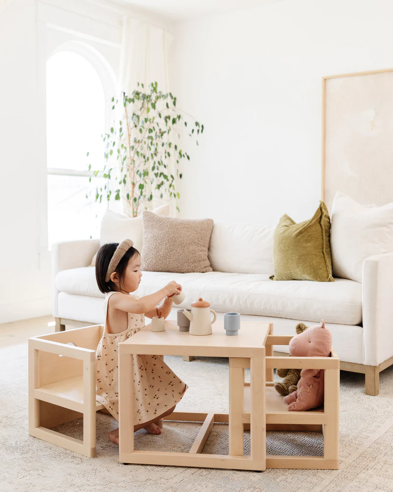 Image of child using Piccalio weaning table and chair set.