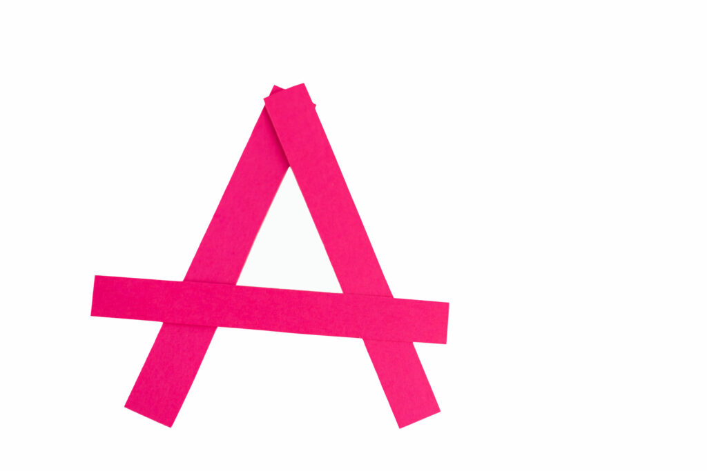 image of a written with tape to represent toys that start with the letter a